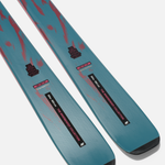 Pair of teal and red graphic skis with black tips and bindings