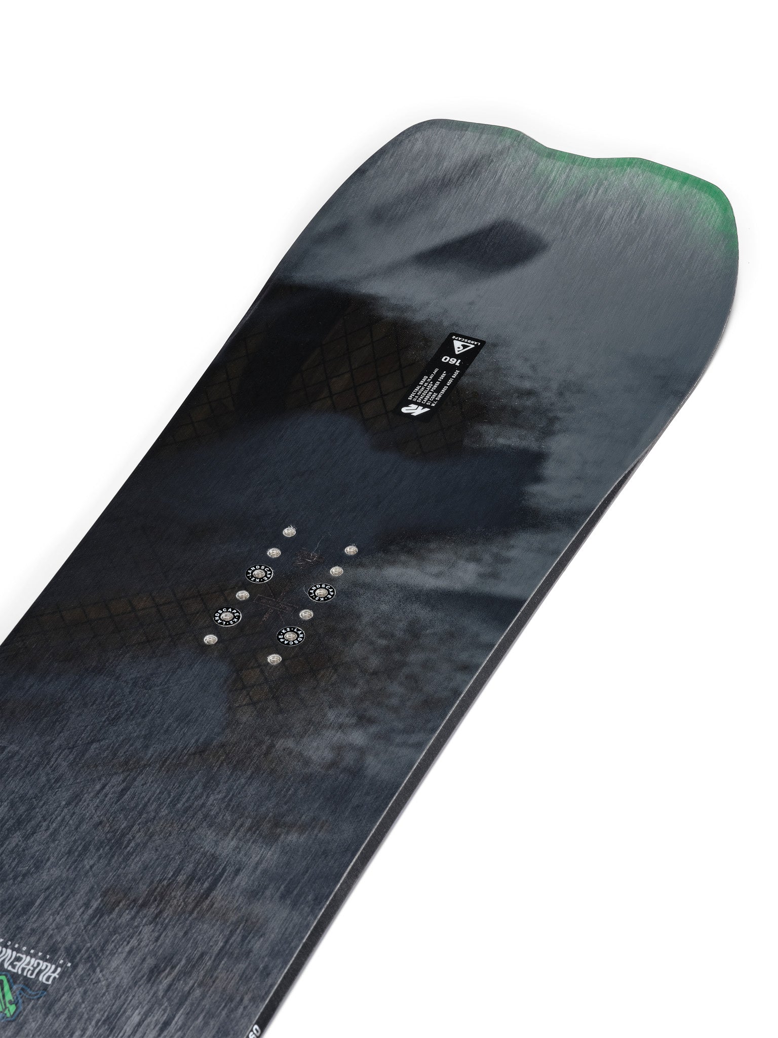 K2 Alchemist snowboard features a dark blue graphic and subtle white branding.