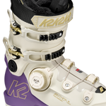 White and purple ski boot with BOA dial, black liner, and adjustable buckles