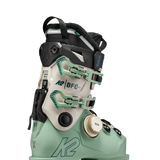 Mint ski boot with BOA dial, K2 BFC straps, and black heel guard.
