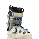 White and grey women's ski boots, side view, with BOA dial and strap buckles