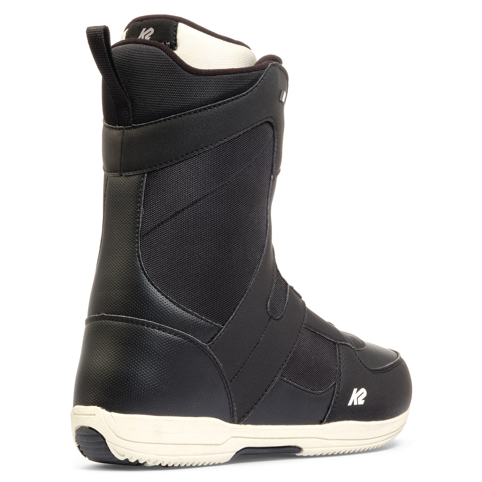 Black K2 Belief snowboard boot with white accents and a textured sole.