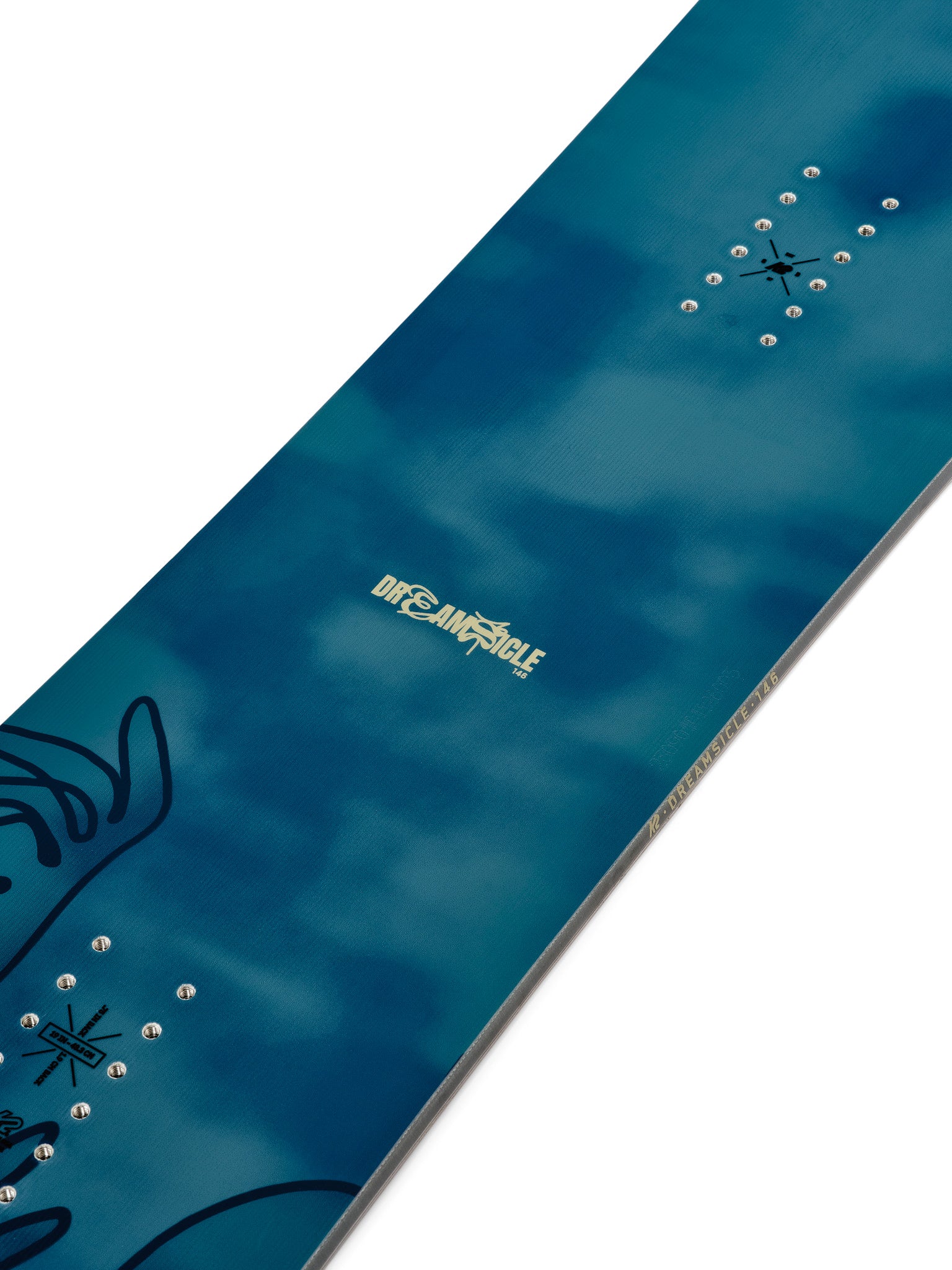 K2 Dreamsicle snowboard features a dark blue design with white graphics.