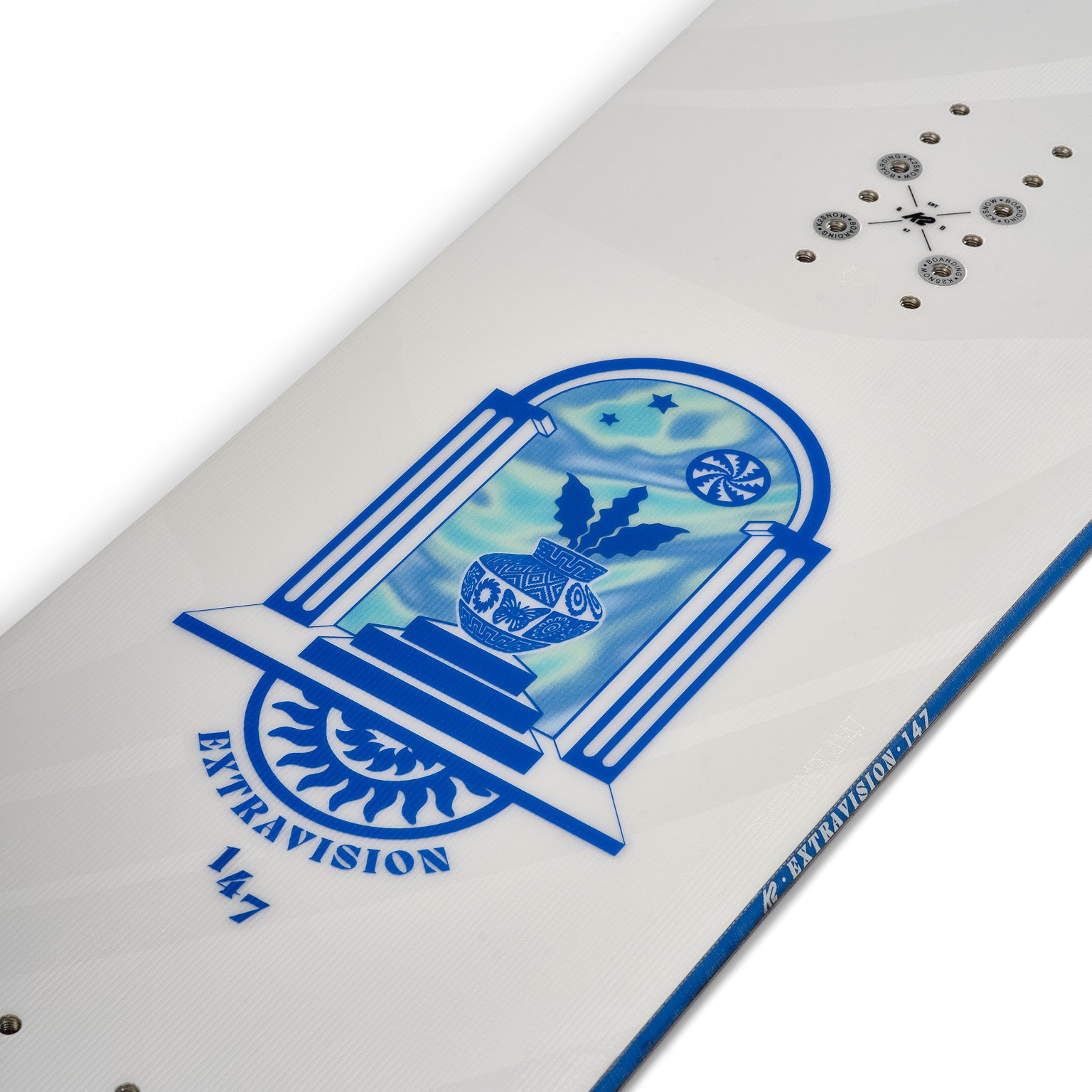 K2 Extravision snowboard features a blue and white graphic design.