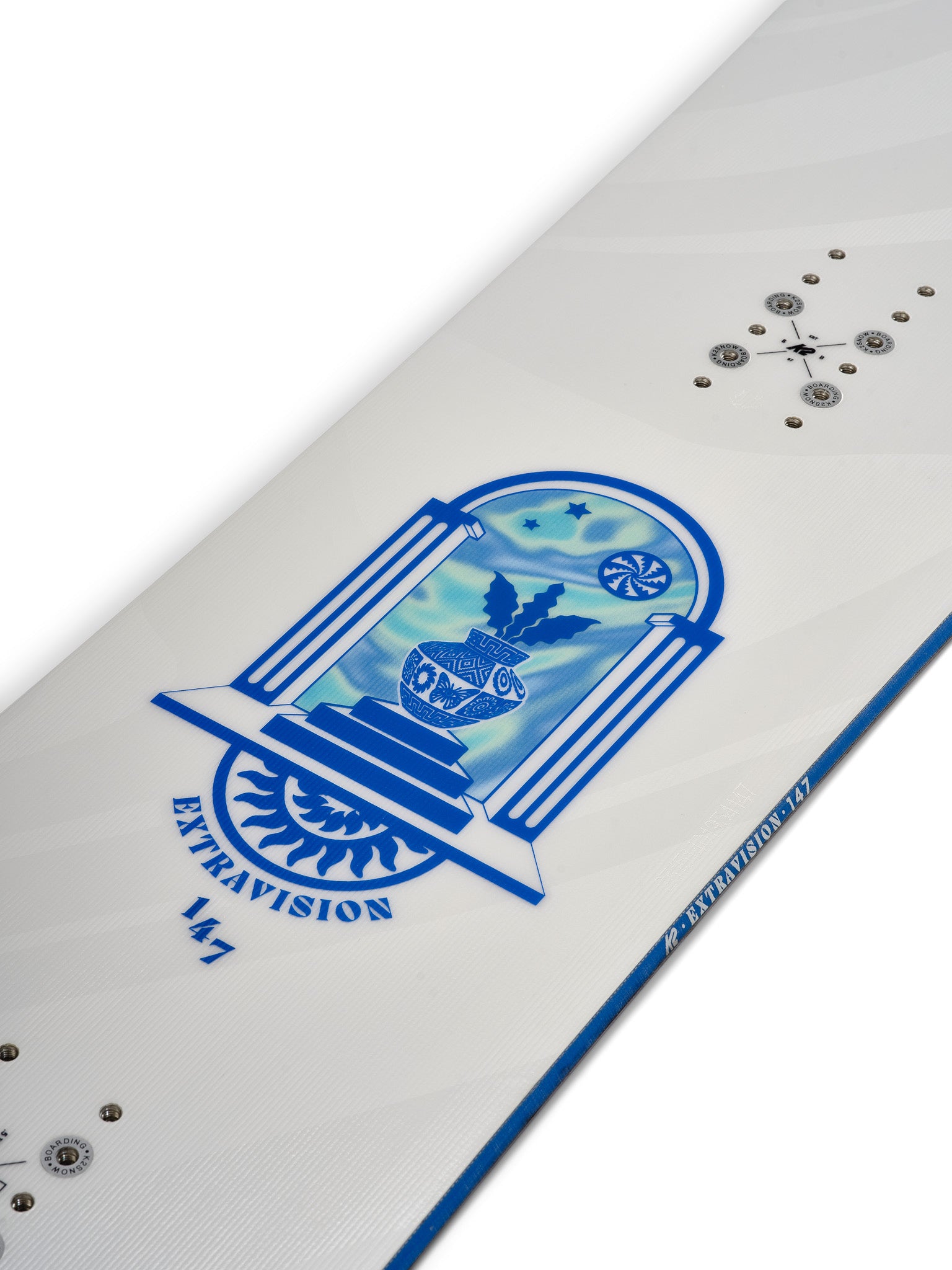 K2 Extravision snowboard features a blue and white graphic design.