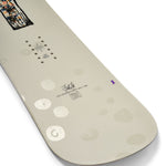 K2 Women's First Lite snowboard 2025 features a white base with purple and floral graphics.