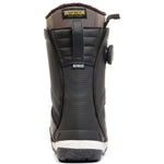 K2 Format 2025 women's snowboard boot features a black and white design with a teal accent.