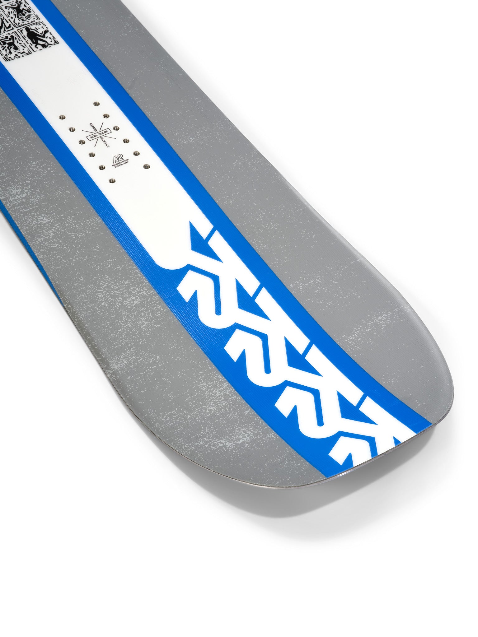 K2 Geometric snowboard features a gray and blue graphic design.