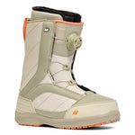 K2 Haven snowboard boot features a light beige color with black and orange accents.