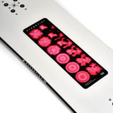 K2 Hypnotist snowboard 2025 features a black top with red graphic accents.