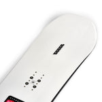 K2 Hypnotist snowboard features a black base with vibrant pink floral graphics.