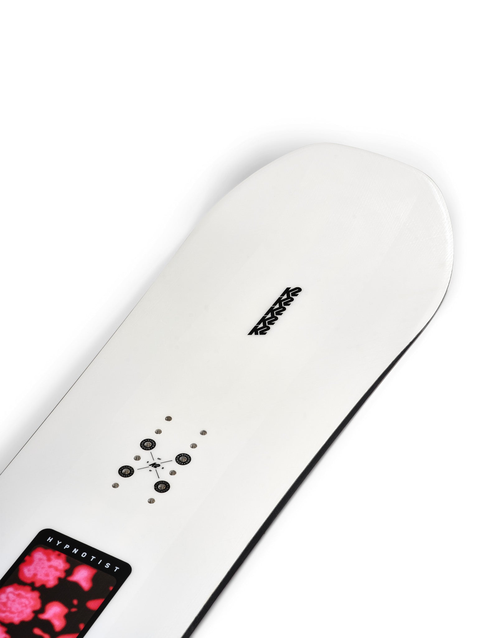 K2 Hypnotist snowboard features a black base with vibrant pink floral graphics.