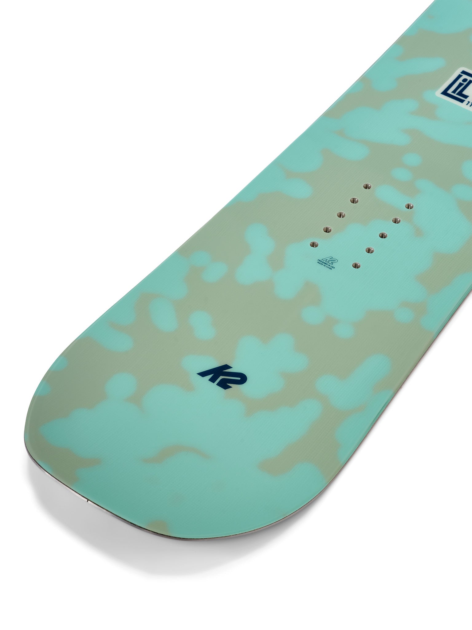 K2 Lil Kat snowboard features a green design with a distinctive pattern and multiple inset screws.
