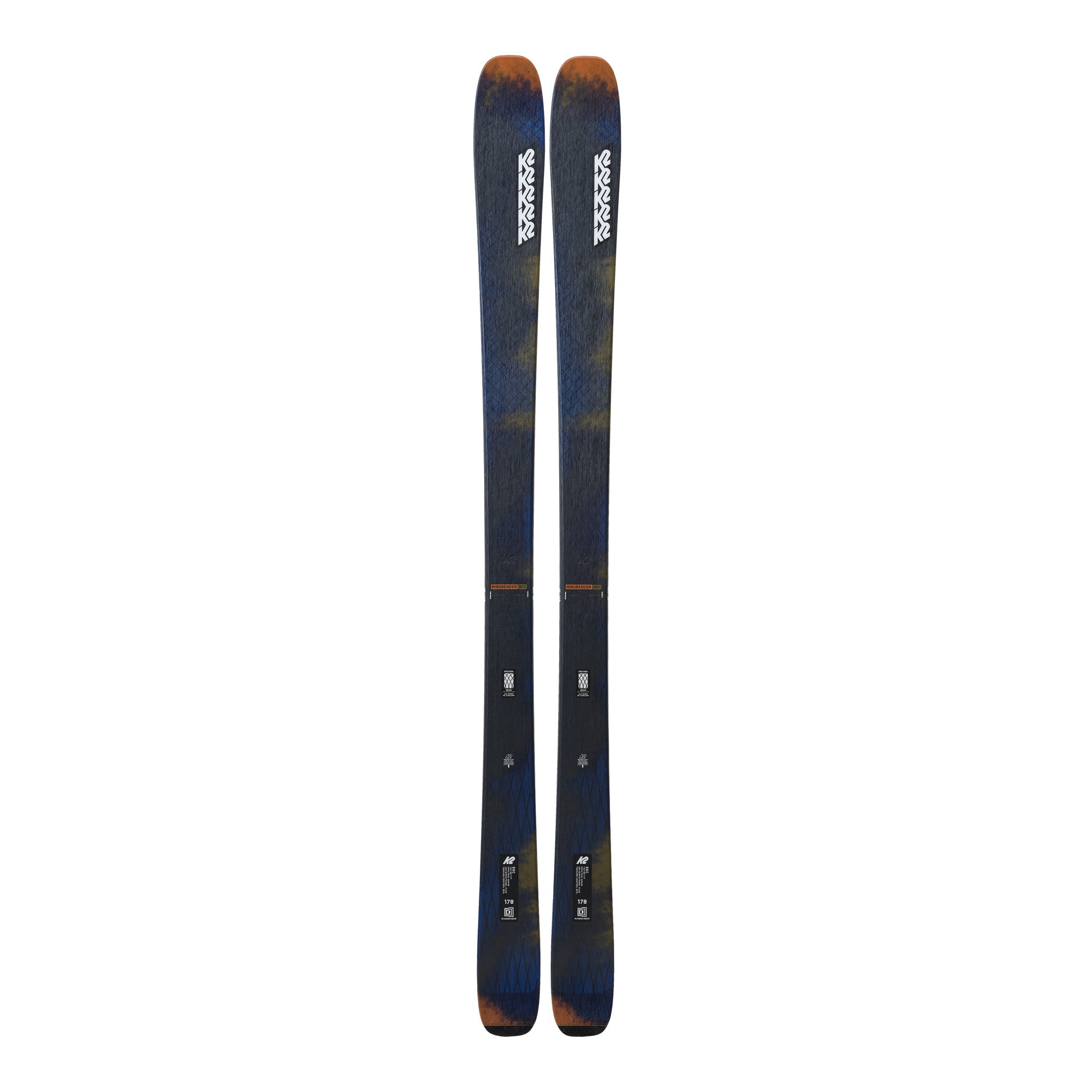 K2 Mindbender 90C skis 2025 feature a black and red design with a distinctive graphic pattern.