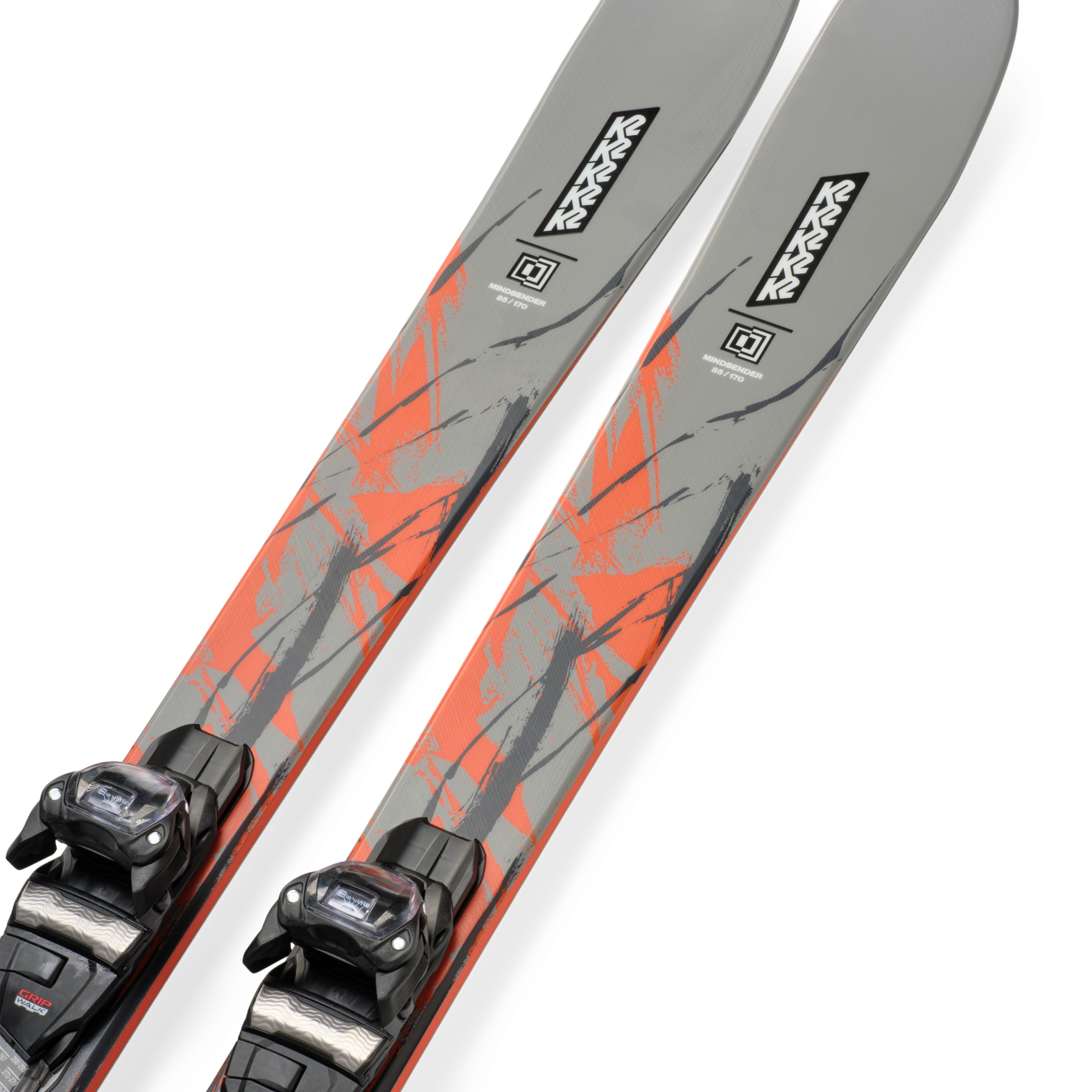 Gray skis with orange graphic streaks and mounted black bindings, angled close-up
