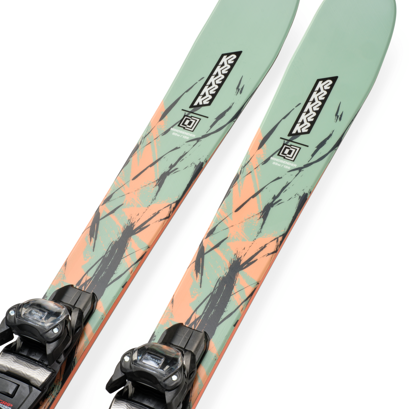 Mint skis with orange graphic tops and black bindings