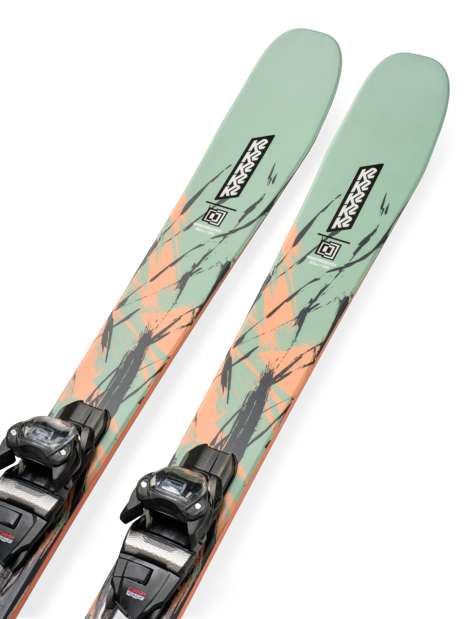 Mint skis with orange graphic tops and black bindings
