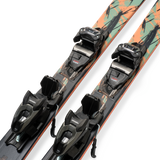 Mint skis with mounted black bindings, angled side view