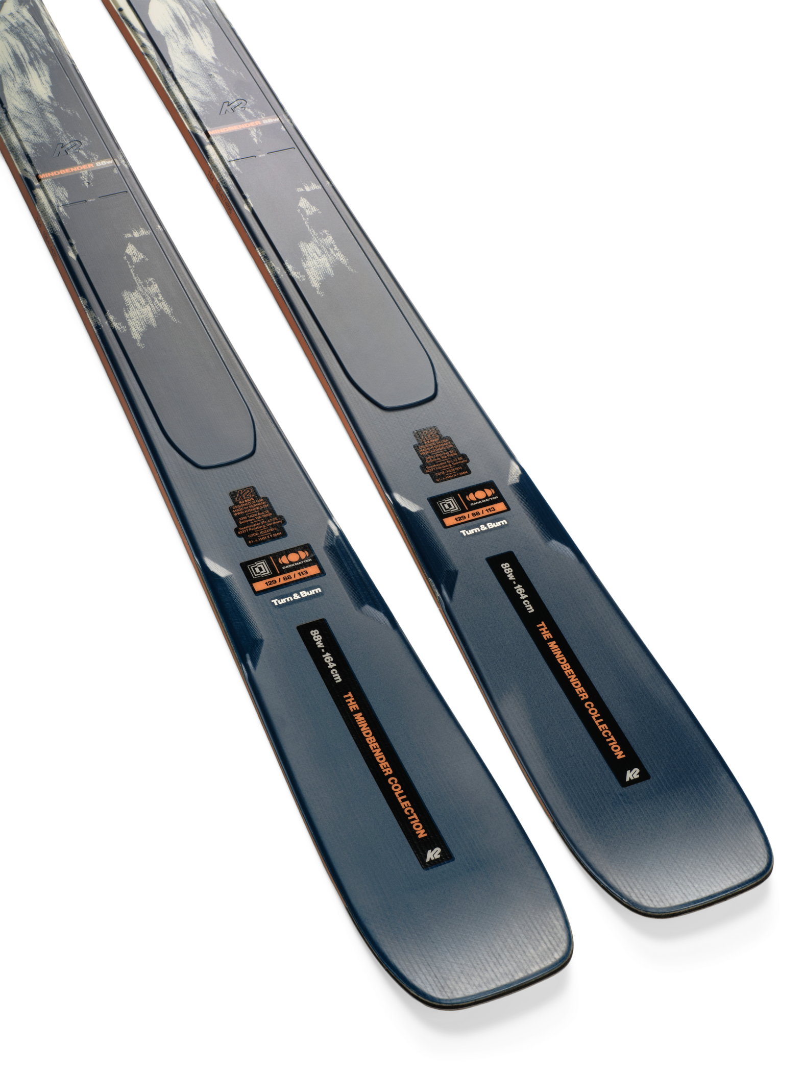 K2 Mindbender 88 skis with blue textured bases, orange markers and K2 branding