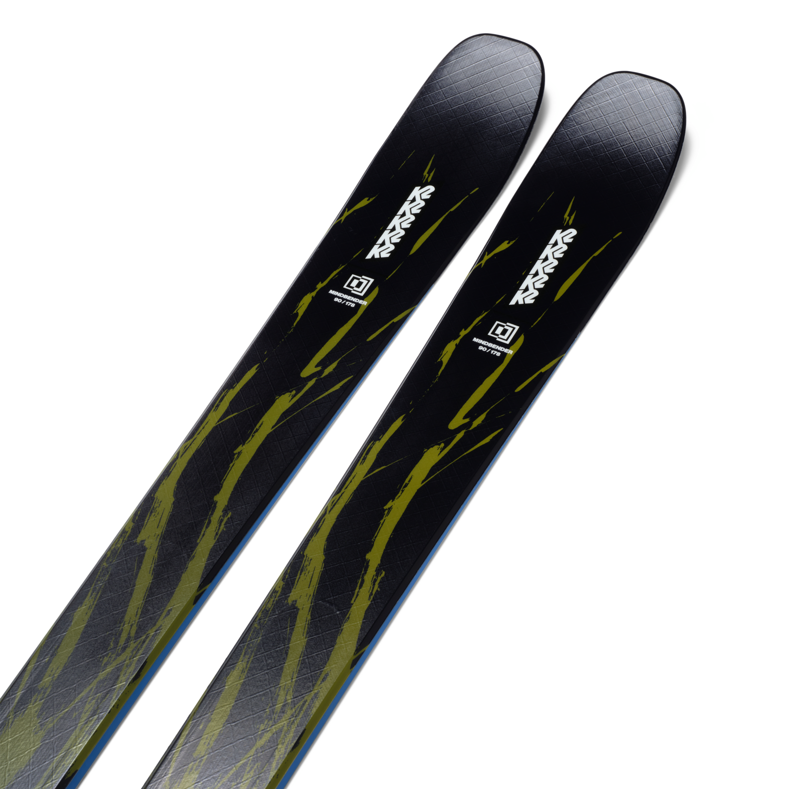 Pair of black skis with lime abstract graphics, angled top view