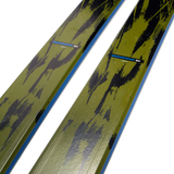 Lime-and-black skis with yellow topsheet and blue stripe, angled view