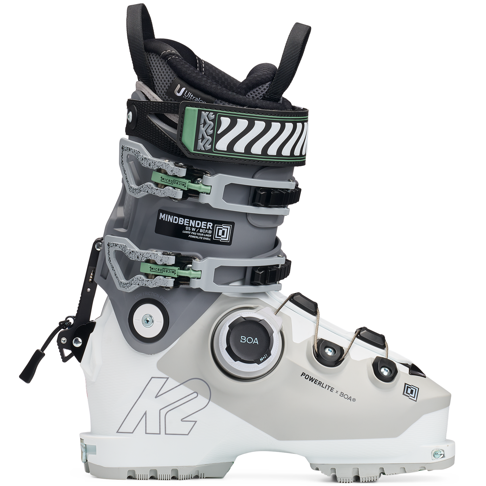 White and grey women’s BOA ski boots, side view, green buckles and dial