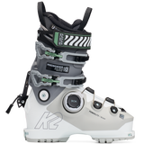 White and grey women’s BOA ski boots, side view, green buckles and dial