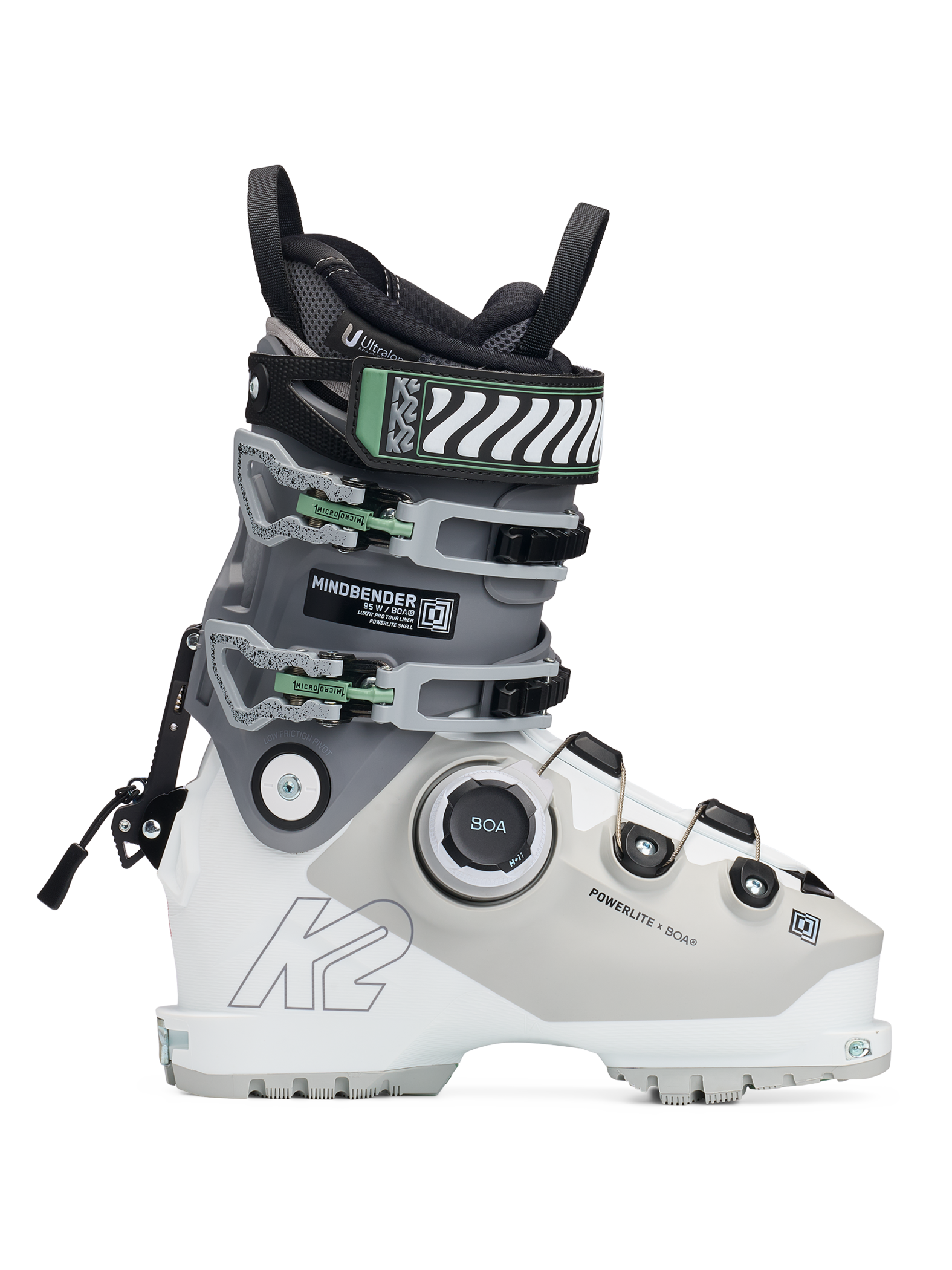 White and grey women’s BOA ski boots, side view, green buckles and dial