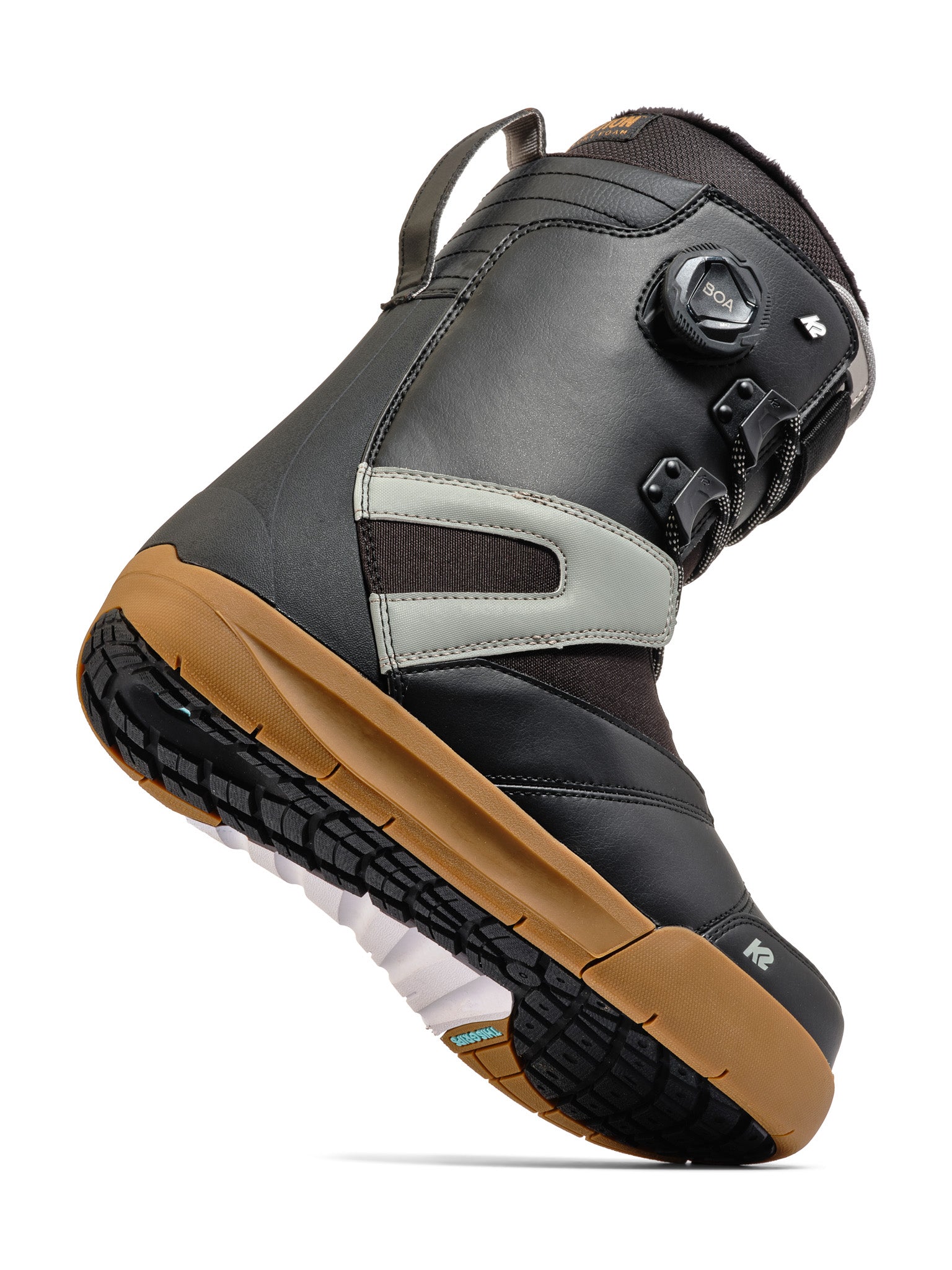 K2 Boundary snowboard boot features a gray and black colorway with BOA lacing system and brown sole.