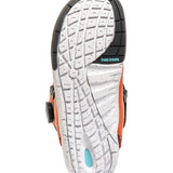 K2 Boundary 2025 snowboard boot sole features a white and orange speckled design with black lugs.