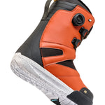 Black and orange K2 Boundary snowboard boot features a BOA lacing system and textured sole.