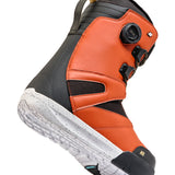Black and orange K2 Boundary snowboard boot features a BOA lacing system and textured sole.