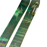 K2 Reckoner 102 skis with green forest graphic and '102' markings