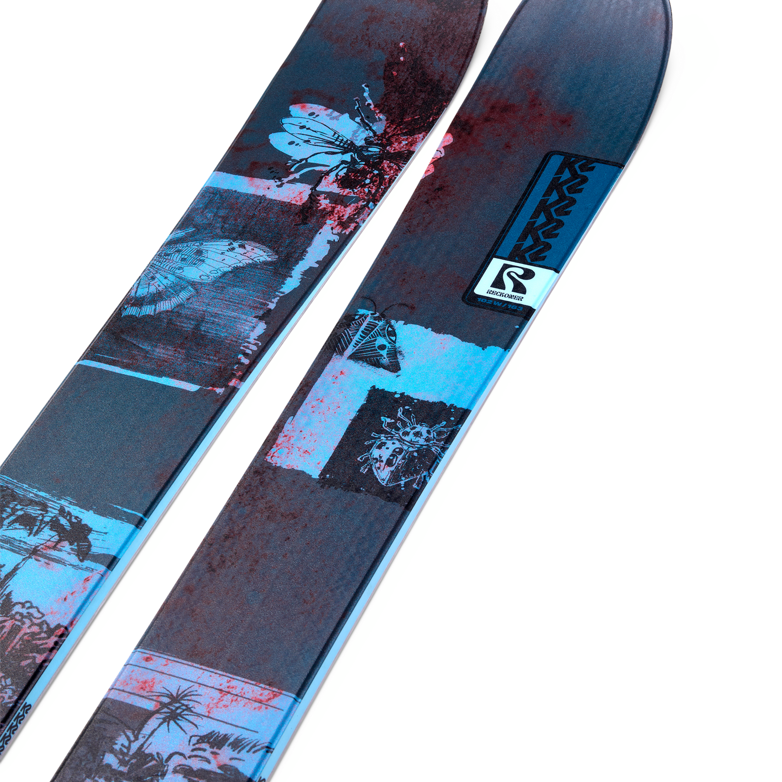 Women's blue and dark graphic twin-tip skis, angled close-up