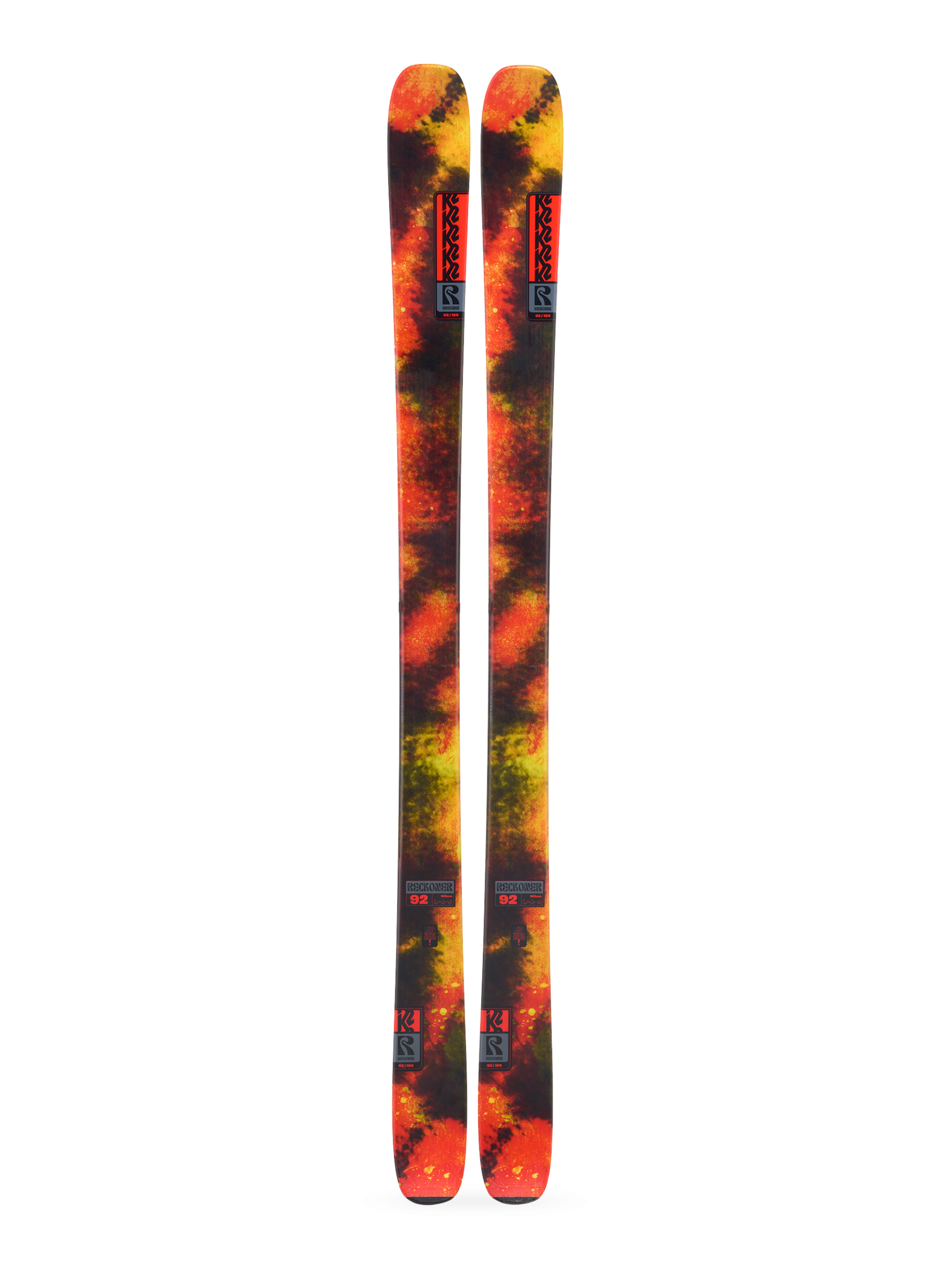 K2 Reckoner 92 skis, orange-yellow tie-dye graphic, front view.