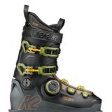 Black ski boot with neon green BOA dial and two front buckles
