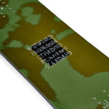 K2 Standard 2025 snowboard features a green graphic and black bindings.