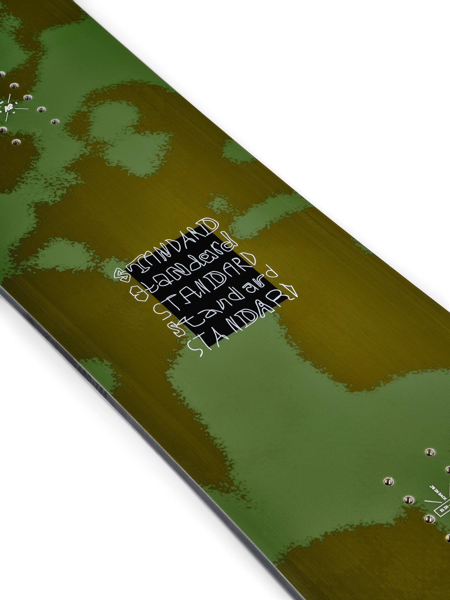 K2 Standard 2025 snowboard features a green graphic and black bindings.