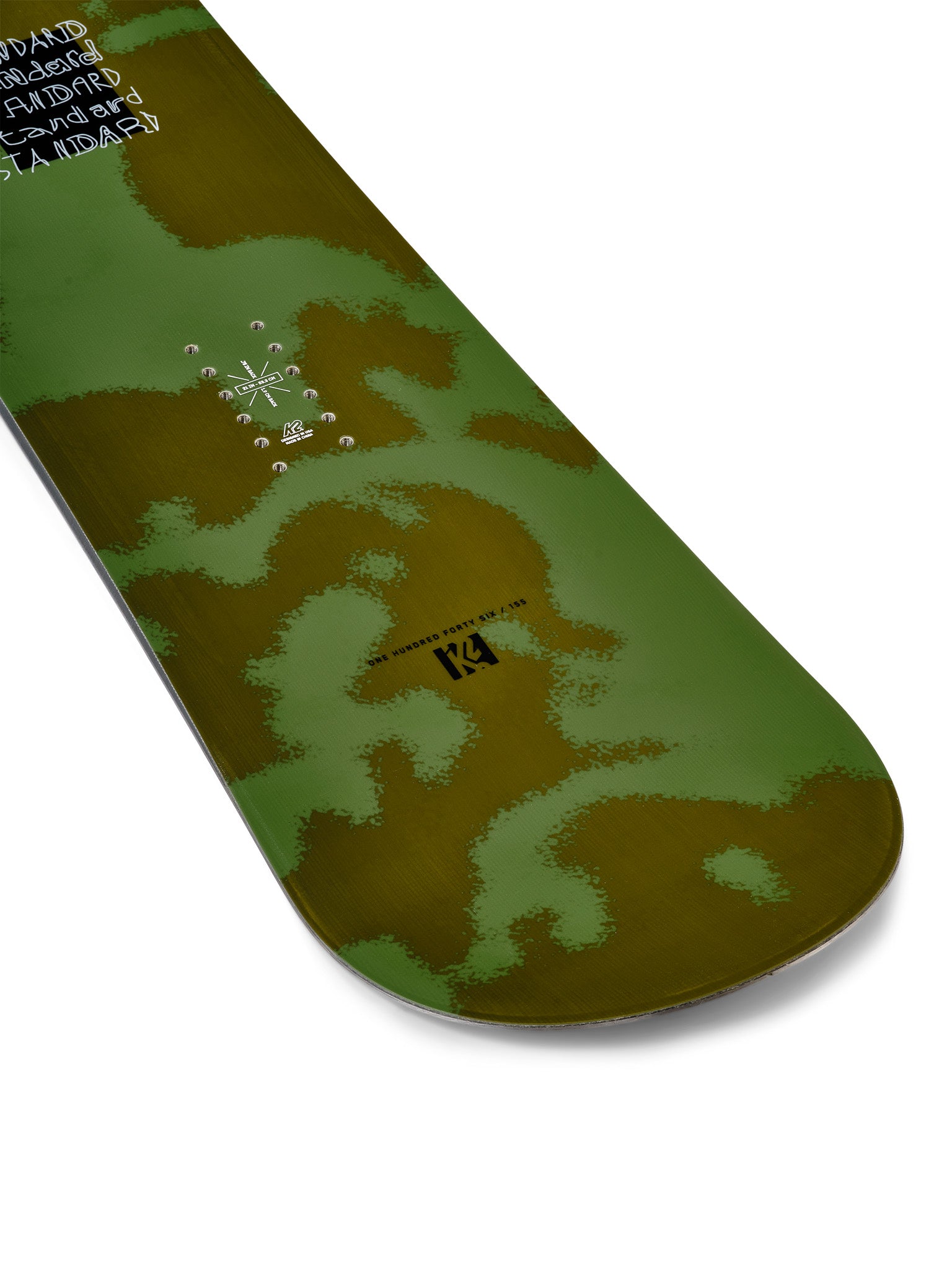 K2 Standard snowboard 2025 features a vibrant green and white graphic design.