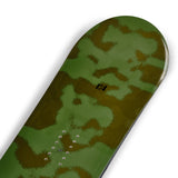 K2 Standard 2025 snowboard features a green and black camouflage design.