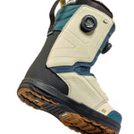 K2 Trance 2025 snowboard boot features a dark gray and cream colorway with a visible Boa dial.