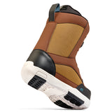 K2 YOU+H snowboard boot, brown and black colorway, features a textured sole and distinctive design.
