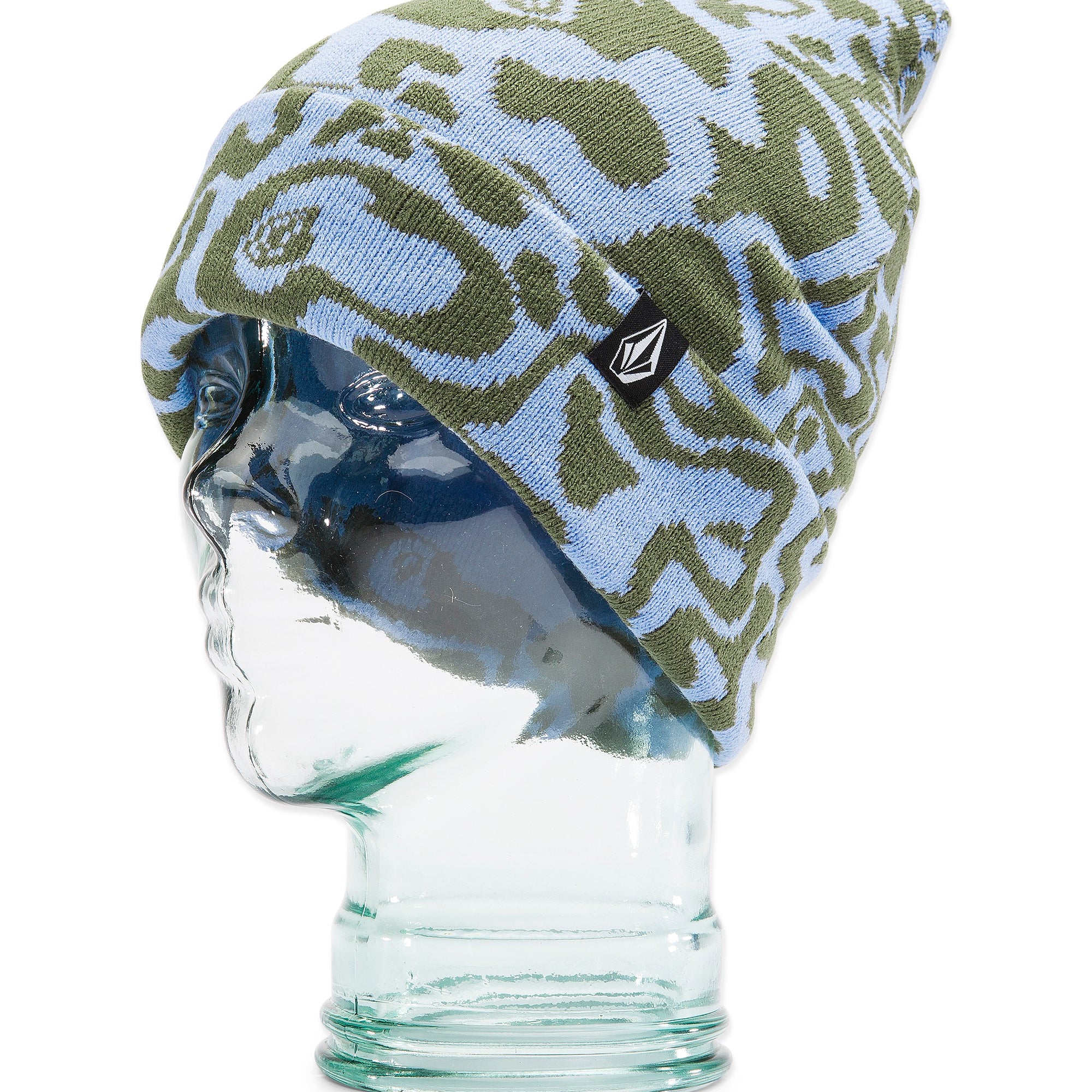 Volcom Women's Shred Beanie 2025 - A light blue beanie with a green abstract pattern and a black tag featuring a white logo on the front.