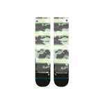 Stance Junior's Hassagore Snow Sock 2025 - A pair of green snow socks with a camouflage pattern and orange stripes.