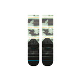 Stance Junior's Hassagore Snow Sock 2025 - A pair of snow socks with a green and grey patterned design.