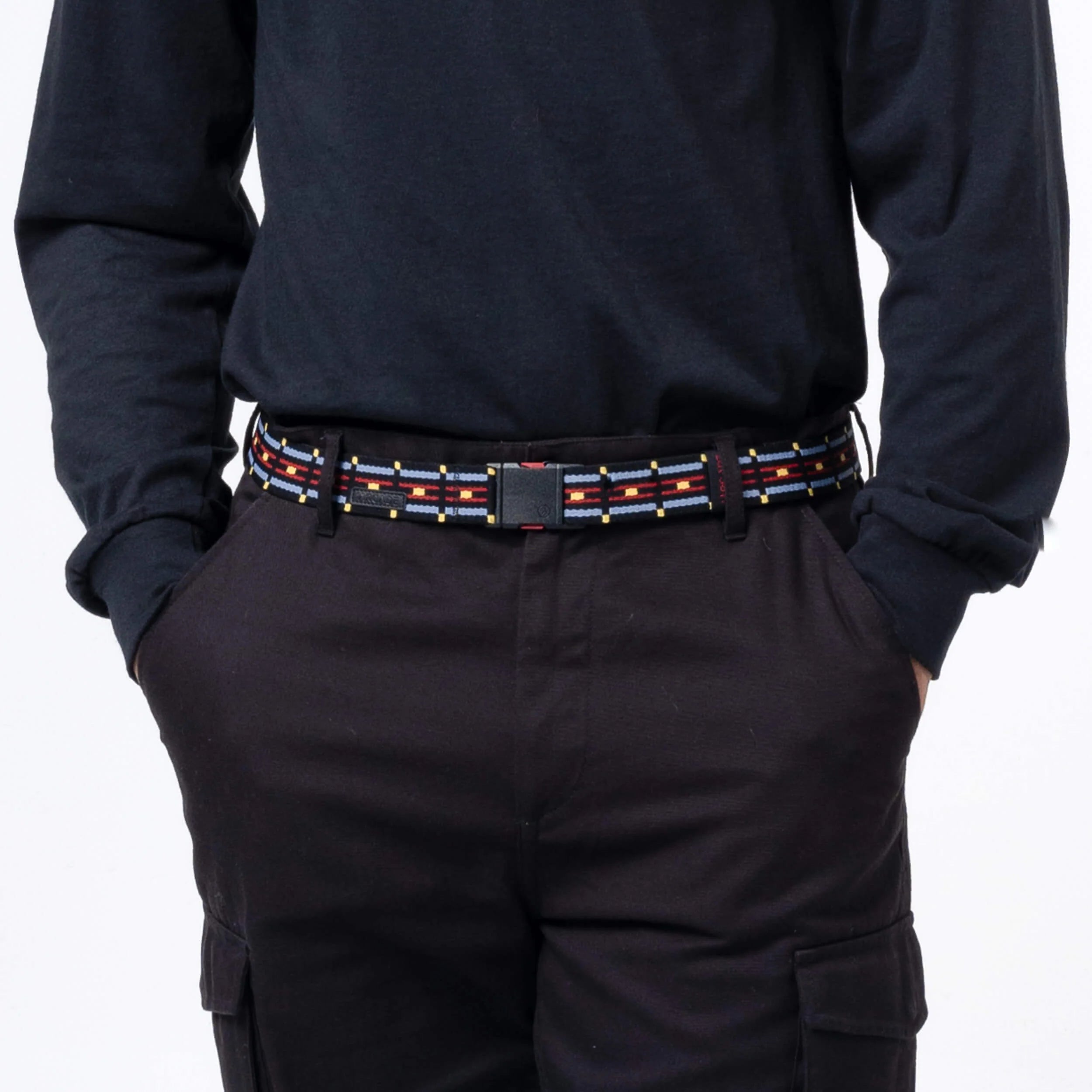 Arcade Vernon Kee Keyah Slim Belt 2025 - Black belt with red, yellow, and gray geometric patterned stripe.