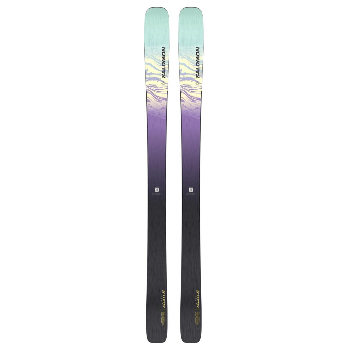Salomon Women's Stance 88 Skis 2025 - A pair of skis with a purple and yellow graphic design on top, featuring wavy lines and abstract shapes.