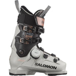 Salomon Women's S/PRO SUPRA BOA 105 Ski Boots - A black and white ski boot with a rose gold logo on the side, featuring a BOA closure system.