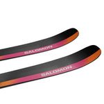 Salomon Stance 96 Skis 2025 - A pair of skis with a black base and pink stripe down the middle.