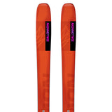 Salomon QST 106 Skis 2025 - A pair of skis with a black and orange color scheme, featuring a geometric pattern on the top sheet.